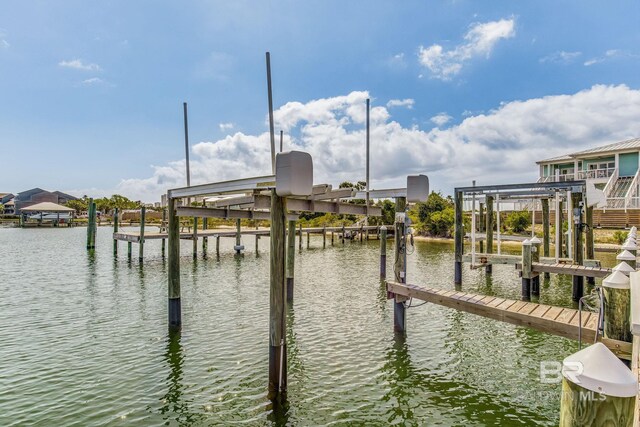 17290 Perdido Key Dr Unit 5B, Pensacola, FL 32507 - dock area with a water view and boat lift
