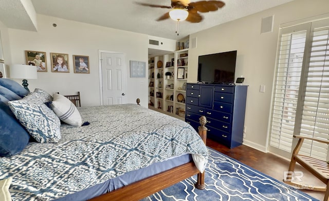 bedroom featuring ceiling fan and visible vents