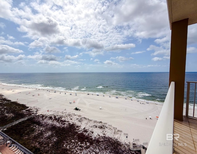 view of water feature with a beach view