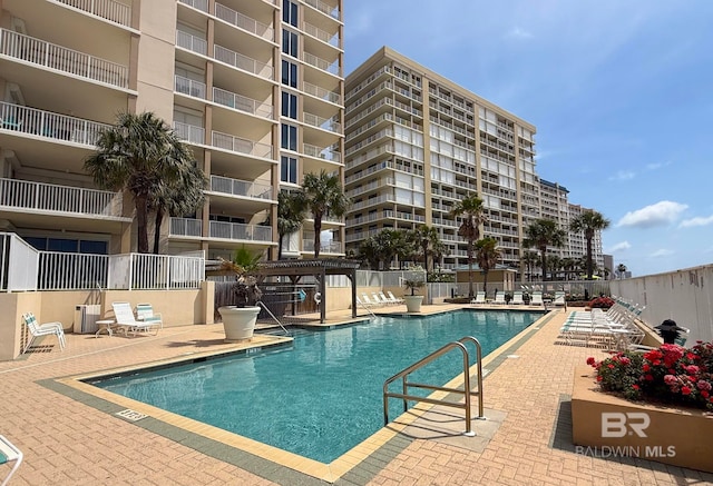 community pool with a patio
