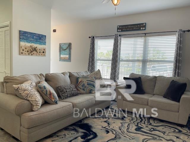 living room featuring ceiling fan