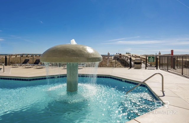 view of pool with a patio