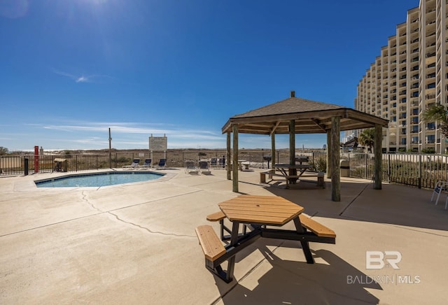 view of pool featuring a gazebo and a patio