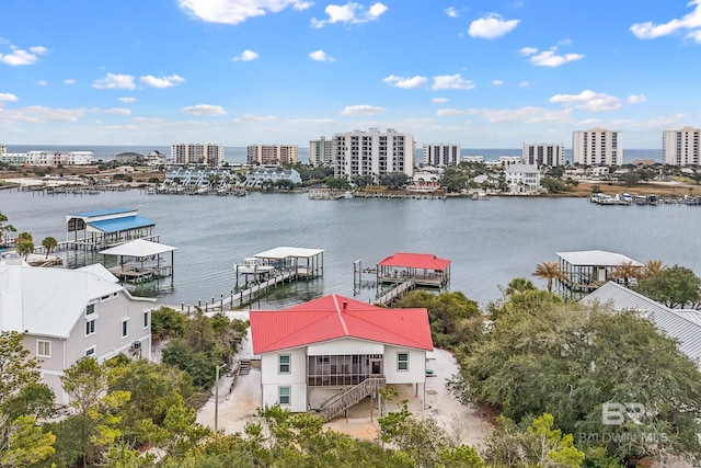 property view of water featuring a view of city and a dock