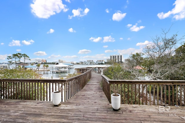 wooden terrace with a water view