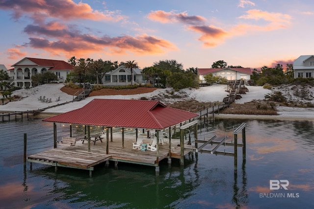 view of dock with a water view and boat lift