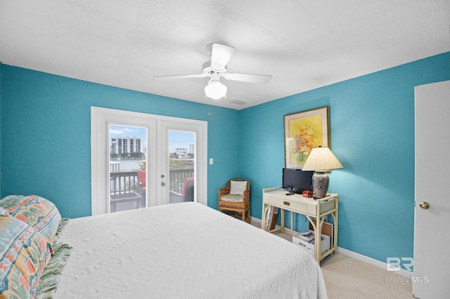 bedroom featuring ceiling fan, light colored carpet, baseboards, access to exterior, and french doors