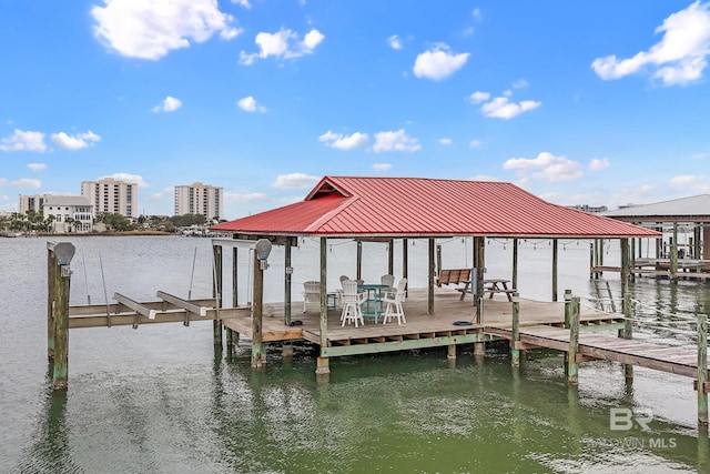 dock area featuring a water view and boat lift