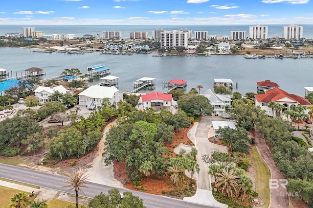 aerial view featuring a water view and a view of city