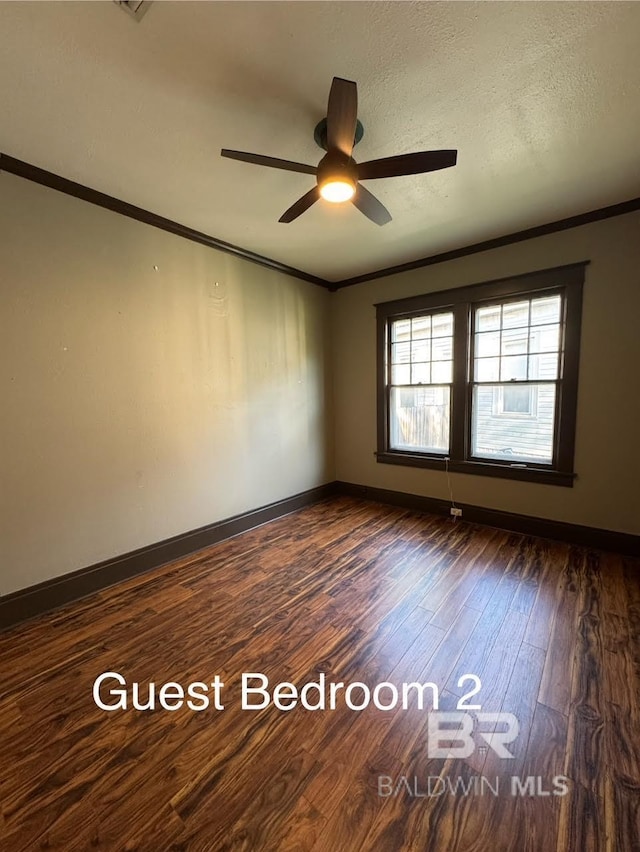 253 Cherokee St, Mobile, AL 36606 - unfurnished room featuring ornamental molding, ceiling fan, dark wood finished floors, and baseboards