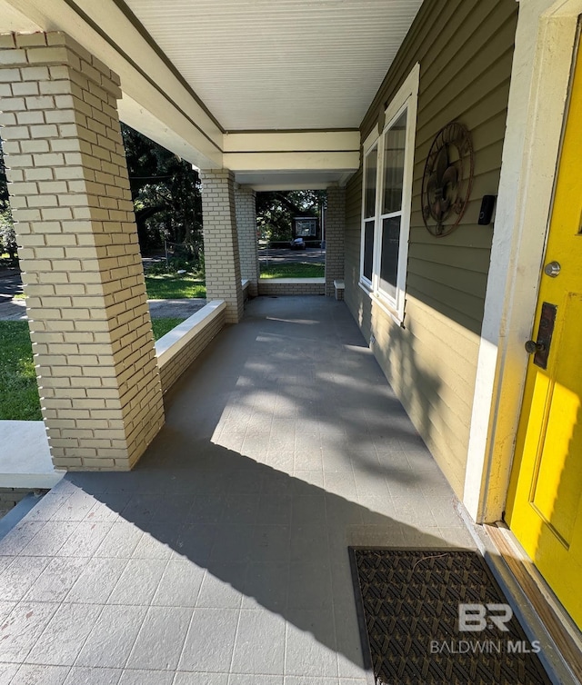 253 Cherokee St, Mobile, AL 36606 - view of patio / terrace featuring covered porch