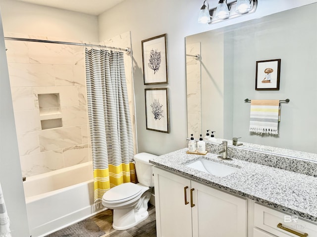 full bathroom with vanity, wood-type flooring, shower / bath combination with curtain, and toilet