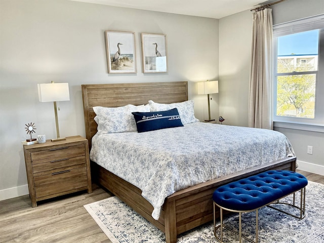 bedroom featuring light hardwood / wood-style flooring