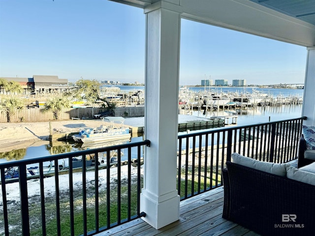 balcony featuring a water view