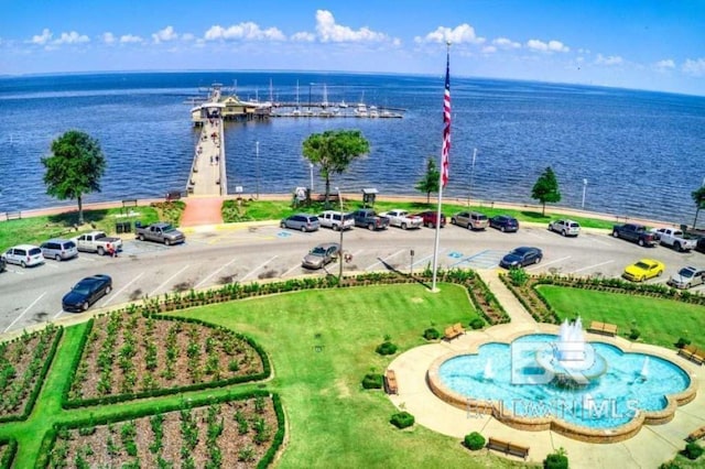 bird's eye view with a water view