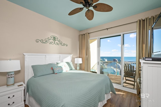 bedroom with dark wood-type flooring, access to outside, and ceiling fan