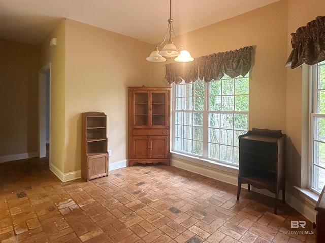 interior space featuring a notable chandelier