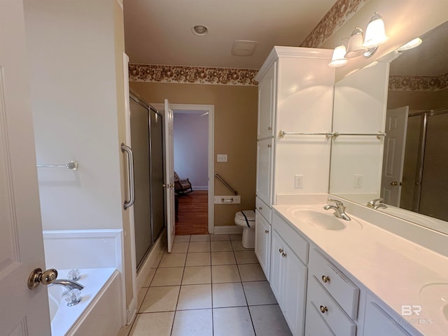 full bathroom featuring tile flooring, plus walk in shower, toilet, and dual bowl vanity