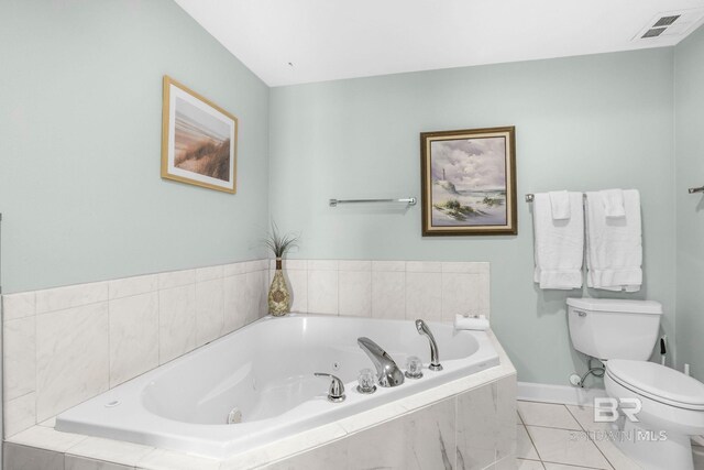 26200 Perdido Beach Blvd Unit 508, Orange Beach, AL 36561 - full bathroom with visible vents, toilet, a tub with jets, and baseboards