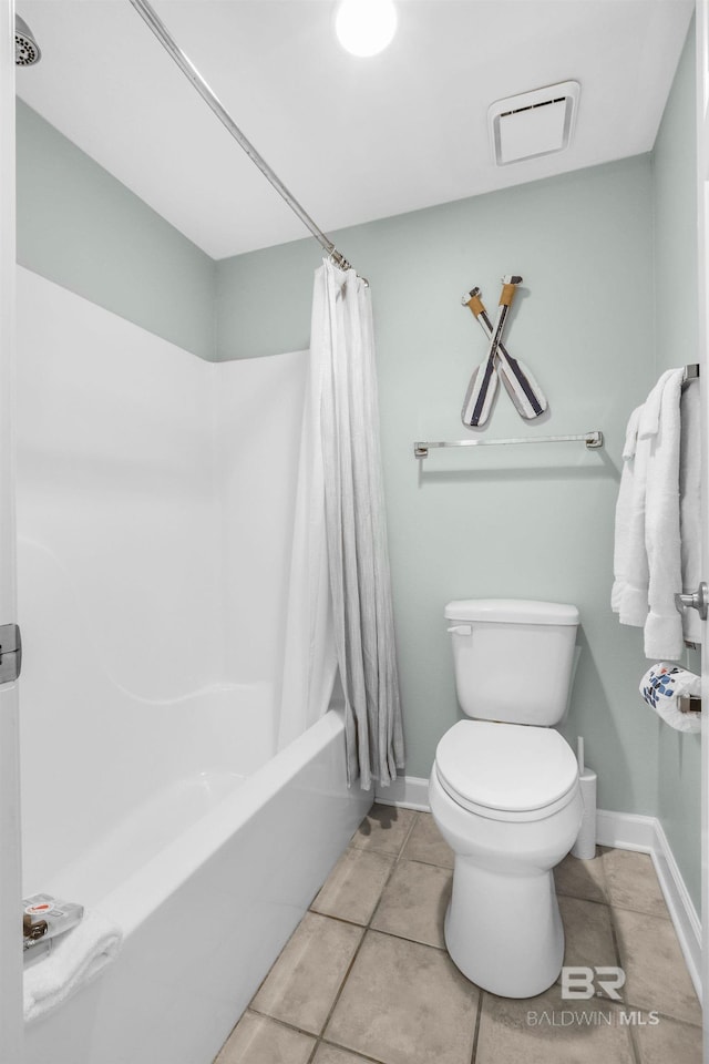 26200 Perdido Beach Blvd Unit 508, Orange Beach, AL 36561 - bathroom with baseboards, shower / bath combo, tile patterned floors, toilet, and visible vents