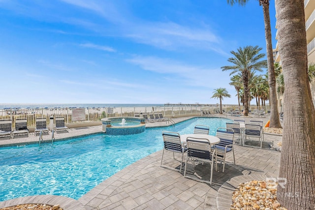 26200 Perdido Beach Blvd Unit 508, Orange Beach, AL 36561 - view of pool with a patio area and a pool with connected hot tub