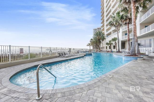 26200 Perdido Beach Blvd Unit 508, Orange Beach, AL 36561 - community pool with a patio area and fence