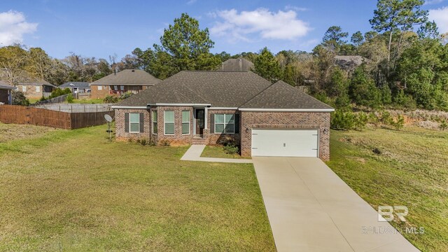 ranch-style home featuring concrete driveway, brick siding, an attached garage, and fence