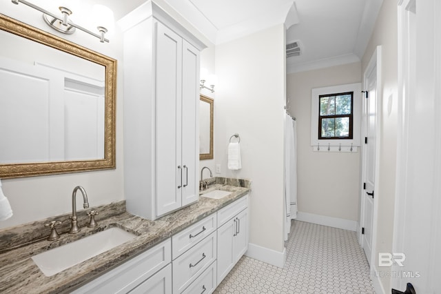 full bathroom with crown molding, visible vents, a sink, and double vanity