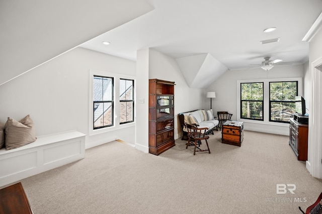 sitting room featuring light carpet, visible vents, a ceiling fan, vaulted ceiling, and recessed lighting