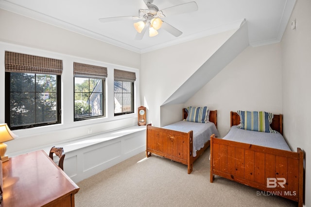 bedroom featuring light carpet, a ceiling fan, and crown molding