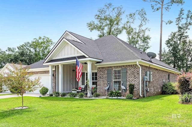 view of front of home featuring a garage and a front lawn