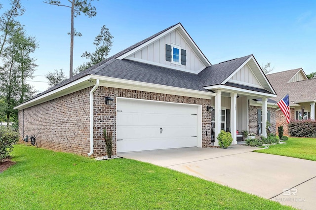 craftsman-style home featuring a garage and a front lawn