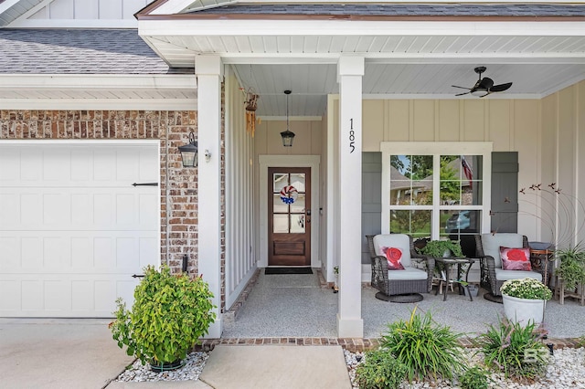 entrance to property with ceiling fan and covered porch