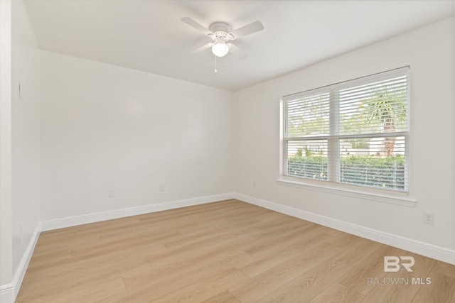 4310 Lauder Ln, Orange Beach, AL 36561 - unfurnished room featuring light wood-style flooring, baseboards, and ceiling fan