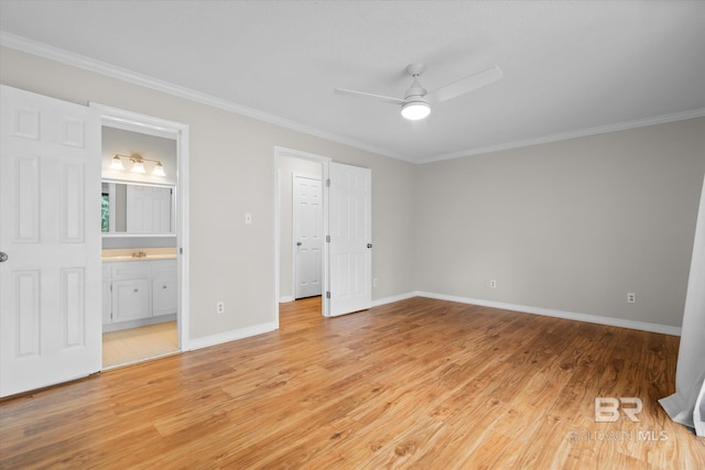 unfurnished bedroom with light wood-style flooring, ensuite bathroom, ornamental molding, a sink, and baseboards