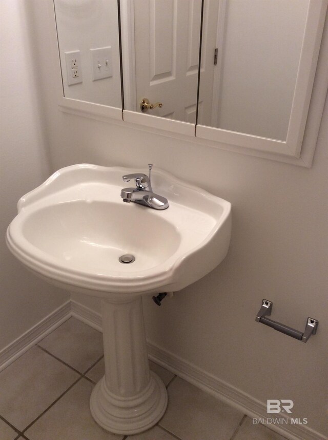 9577 Villas Dr, Foley, AL 36535 - bathroom with baseboards and tile patterned floors