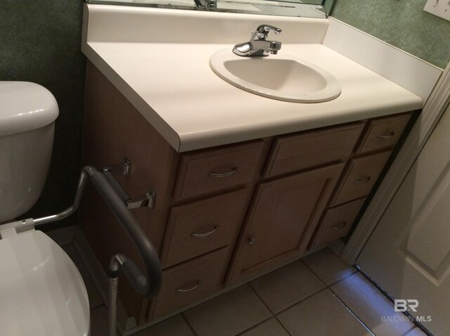9577 Villas Dr, Foley, AL 36535 - half bath with toilet, tile patterned floors, and vanity
