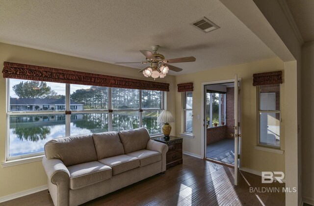 9577 Villas Dr, Foley, AL 36535 - sunroom / solarium featuring plenty of natural light and visible vents