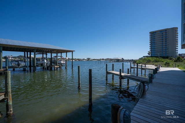 dock area featuring a water view and boat lift