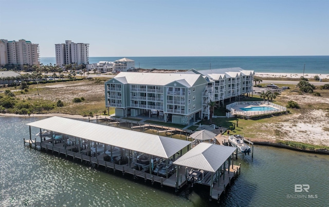 birds eye view of property featuring a water view