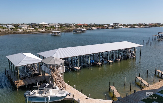 dock area featuring a water view and boat lift