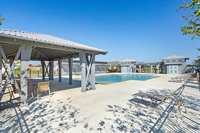 view of pool with a patio area and a gazebo