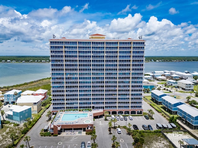 view of building exterior with a water view