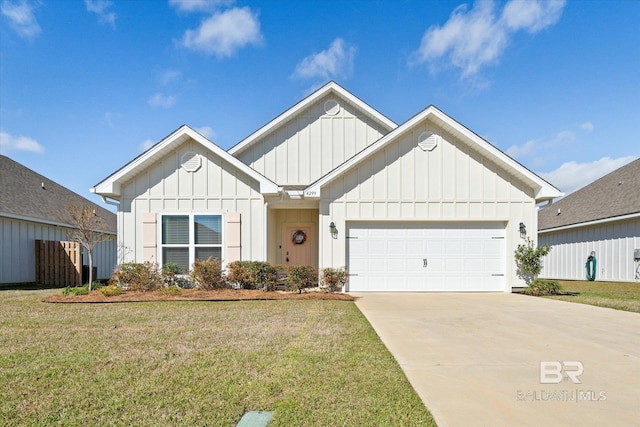 4299 Montague Dr, Gulf Shores, AL 36542 - view of front of property with board and batten siding, driveway, and an attached garage