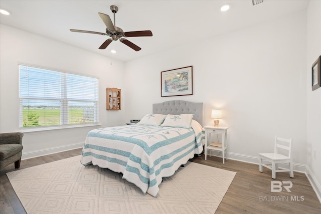 4299 Montague Dr, Gulf Shores, AL 36542 - bedroom with wood finished floors, recessed lighting, baseboards, and ceiling fan