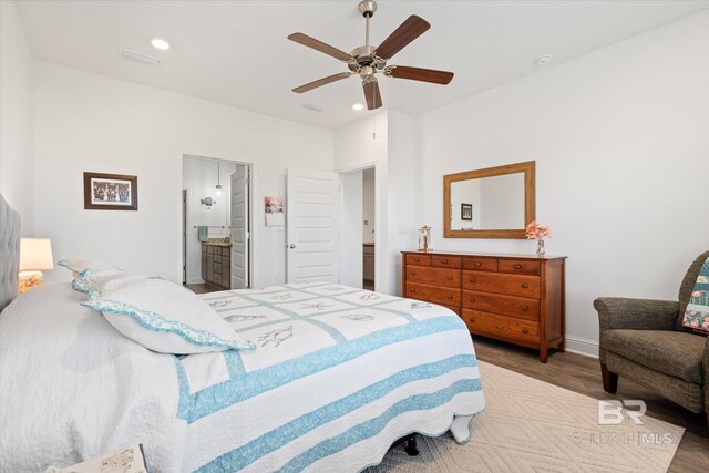4299 Montague Dr, Gulf Shores, AL 36542 - bedroom with wood finished floors, a ceiling fan, recessed lighting, and connected bathroom