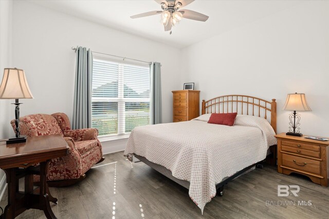 4299 Montague Dr, Gulf Shores, AL 36542 - bedroom featuring wood finished floors and ceiling fan
