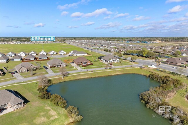 4299 Montague Dr, Gulf Shores, AL 36542 - aerial view of property and surrounding area with nearby suburban area and a large body of water