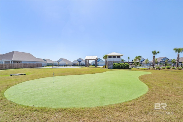 4299 Montague Dr, Gulf Shores, AL 36542 - view of property's community featuring a putting area and a residential view