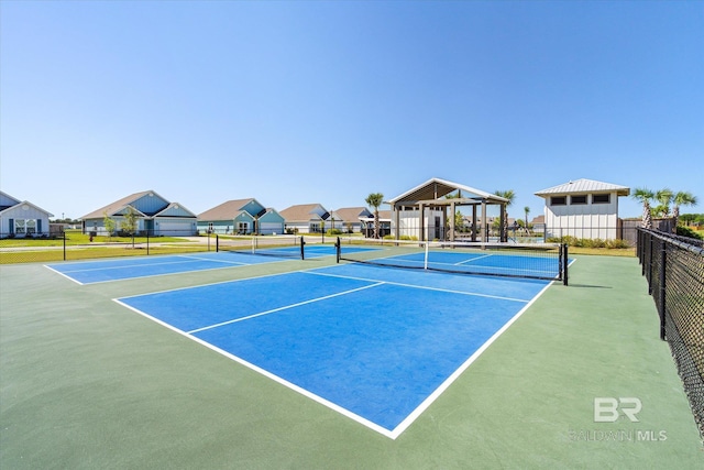 4299 Montague Dr, Gulf Shores, AL 36542 - view of tennis court with fence